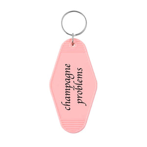 Champagne Problems Motel Keyring